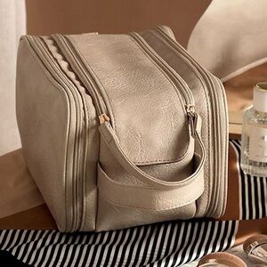 Large Multi-Pocket Cream Women's Travel Cosmetics Bag.